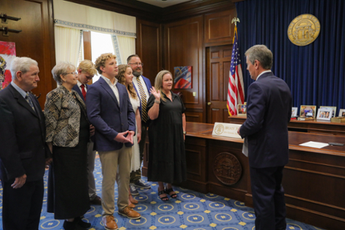 Middle Georgia State University’s Betsy McDaniel being sworn in by Governor Brian Kemp. 